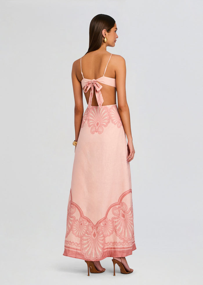Back view of blush pink Maya Maxi Dress with thin straps and a bow at the open back media 4 of 5