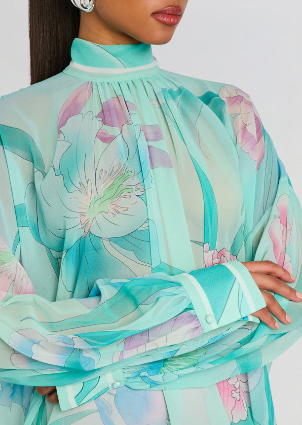 Close up of Olympia Top in mint floral print with gathered neckline and long sleeves with cuffs