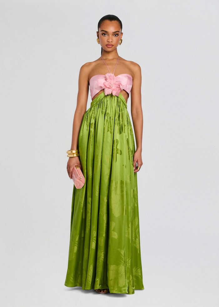 Prudy Dress features a strapless pink bust with a large flower centerpiece and a lime green tropical print flowing skirt. media 1 of 5