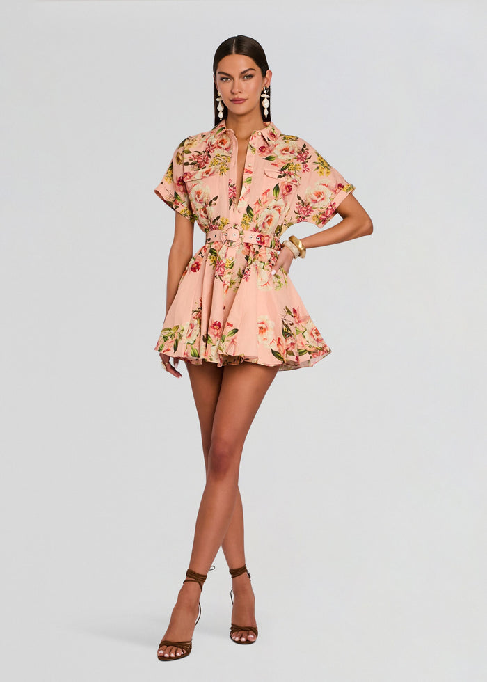 Model wearing a pink floral Ayla short dress with a matching belt buckle and sandals media 1 of 5