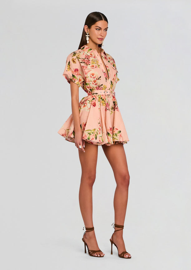 Full-body view of model wearing Ayla Short Dress With Belt Buckle in pink floral print with belted waist and strappy heels