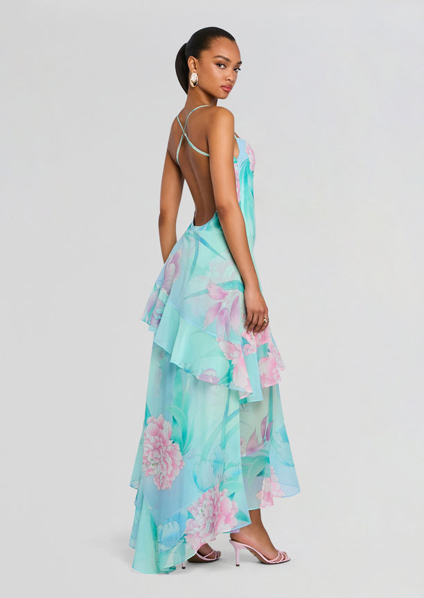 Backless Samara Silk Chiffon Dress with crisscross straps in a pastel teal floral print.