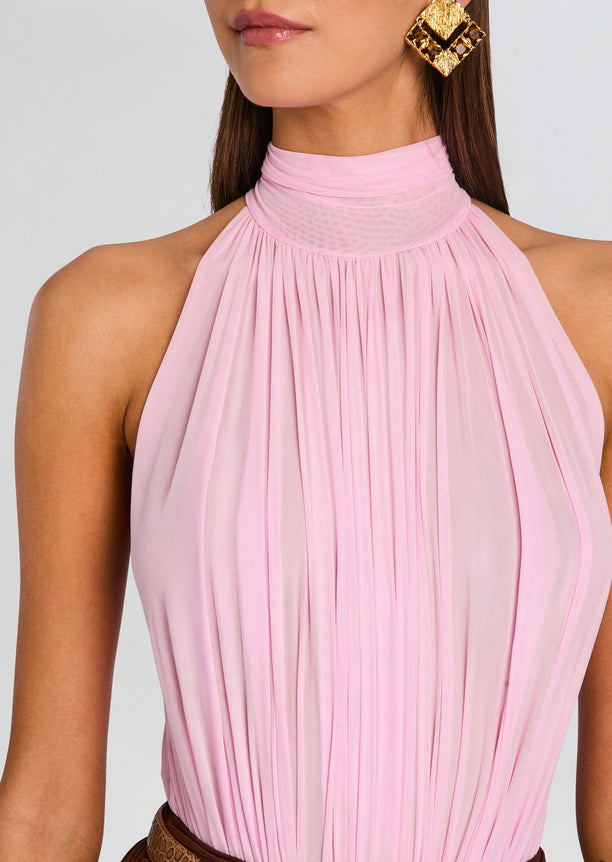 Close-up of pink Isola Bodysuit neckline showing dense vertical pleats and high collar.