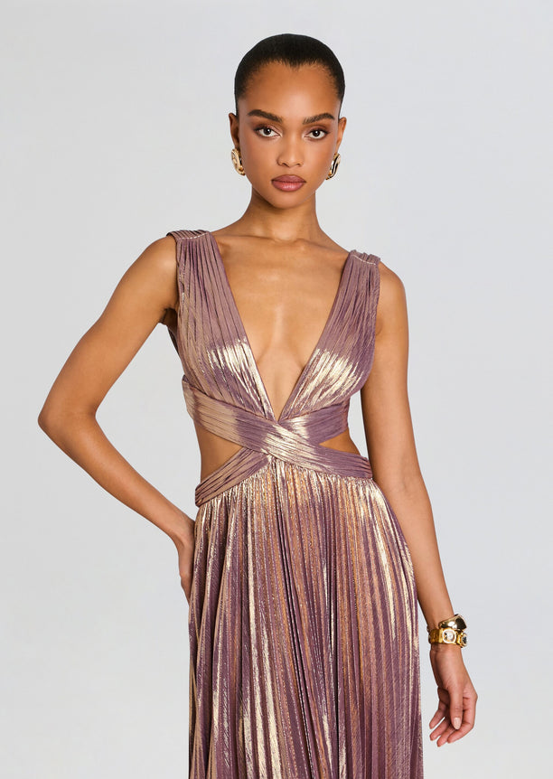 Model wearing Dracey Dress a metallic mauve gown with a deep V neckline and wrapped crisscross waist.