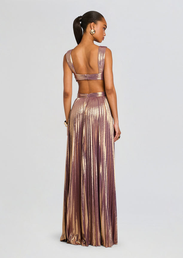 Back view of Dracey Dress showing a wrapped back band and metallic pleated floor length skirt