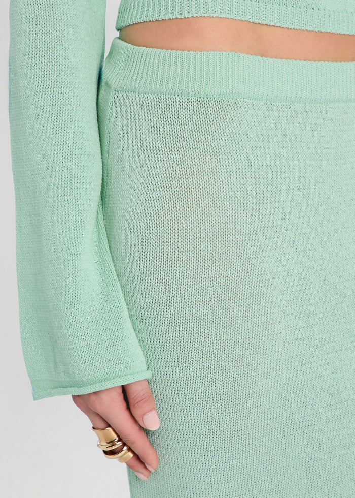 Close-up of mint knit fabric and waistband on the Kora Knit Maxi Skirt. media 3 of 5