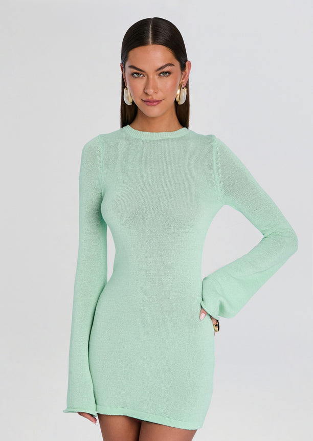 Front view of mint green Bec Knit Mini Dress on a model with long sleeves and a short hem