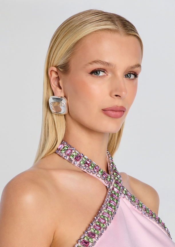 Clive Earring seen on a model with a large square clear crystal in a layered gold-tone bezel.