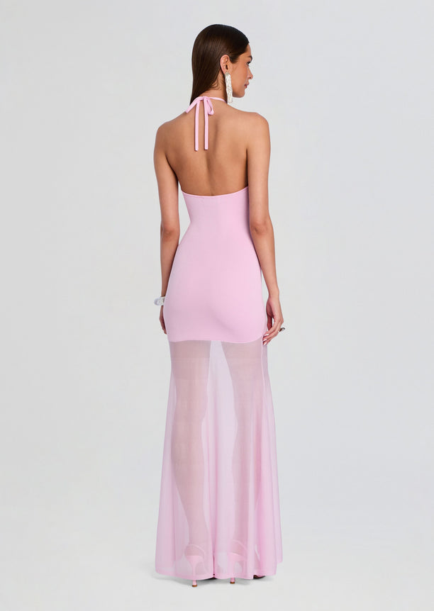 Back view of the pale pink Jemma Knit Maxi Dress showing a halter neck tie and sheer lower skirt panel.