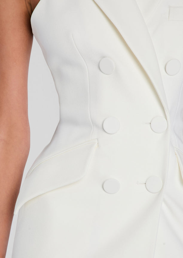 Close-up of a white tailored Juniper Mini Dress with a double-breasted front and lapels.
