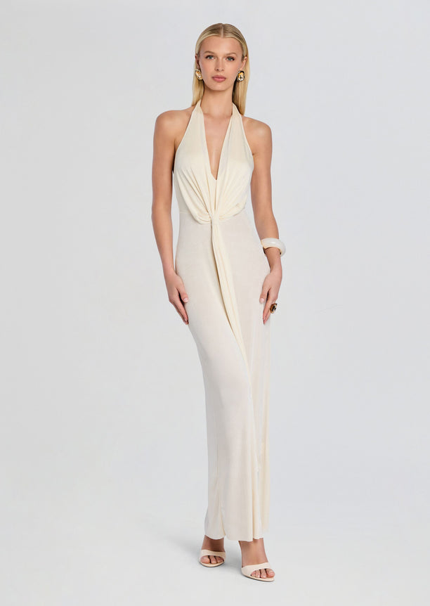 Front view of ivory Kayla Maxi Dress with halter neck and draped knot at the waist