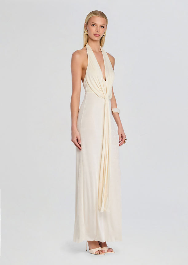 Ivory Kayla Maxi Dress with halter neck and front knot drape on a model