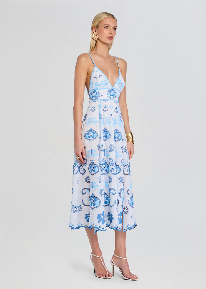 Model wearing a pale blue and white embroidered Gardea Long Dress with thin straps and V neckline. media 3 of 5