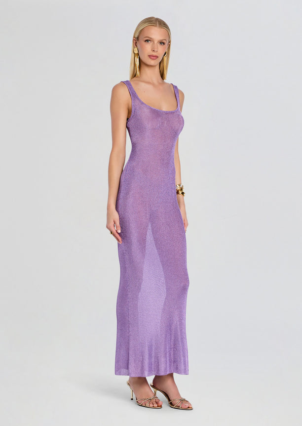 Three-quarter view of the Martina Metallic Knit Maxi Dress in lavender, shown with strappy sandals