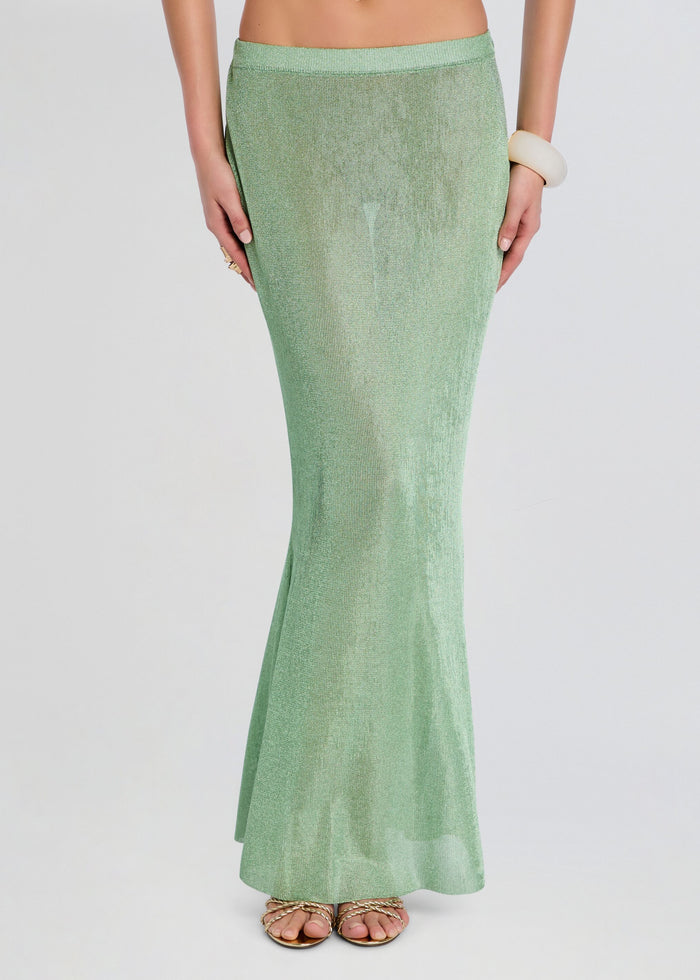 Harmony Metallic Knit Skirt in mint green on model with a fitted silhouette and shimmering fabric. media 1 of 5