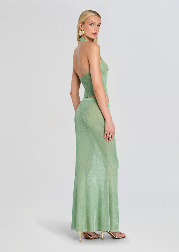 Back view of Minnie Metallic Knit Halter Top and matching skirt on the model showing the halter straps.