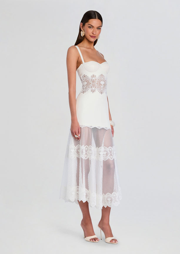 Side view of Olenna Dress on a model showing the lace waist panel and sheer lace skirt