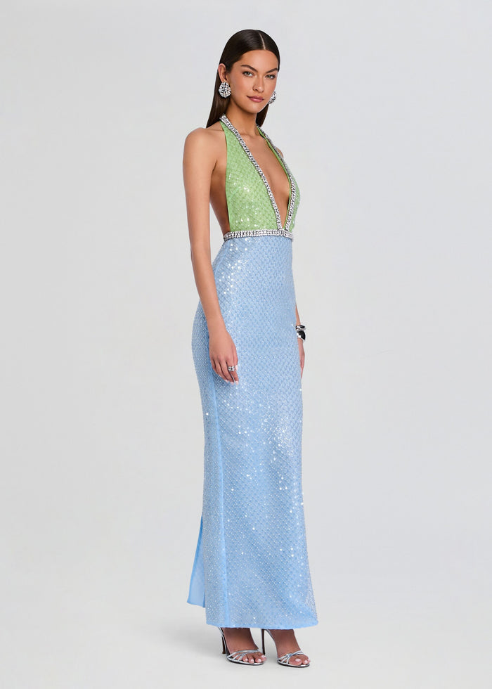 Model wearing a lime green sequin halter bodice with crystal trim and a light blue sequined floor-length skirt. media 3 of 5
