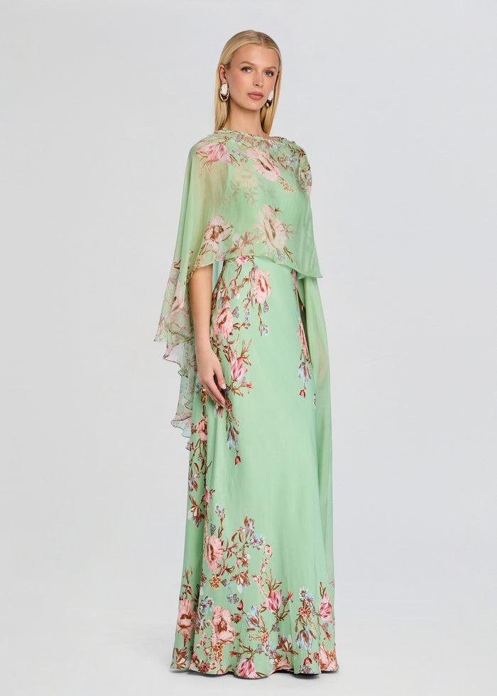 Ezra Ruched Cape gown in mint green with pink floral embroidery and a sheer cape overlay. media 4 of 5
