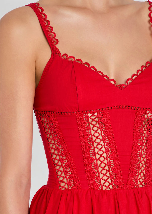 Close-up of the red Gardenia Short Dress bodice showing lace panels and scalloped trim along the neckline and straps