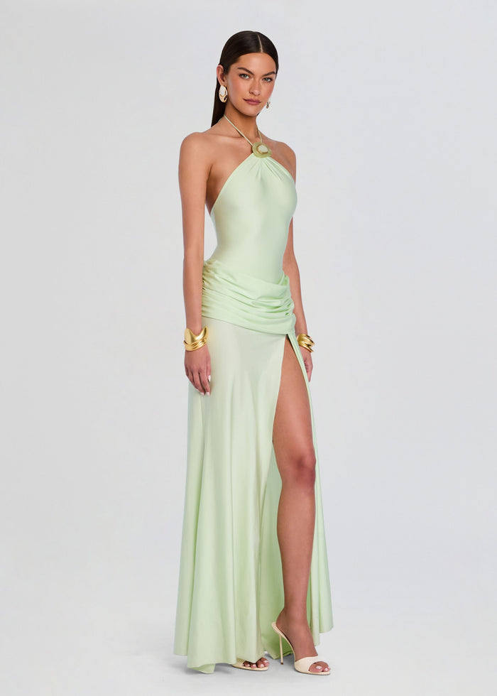 Valentine Maxi Dress in mint green halter neck with ruched waist and high slit, worn with gold jewelry. media 3 of 5