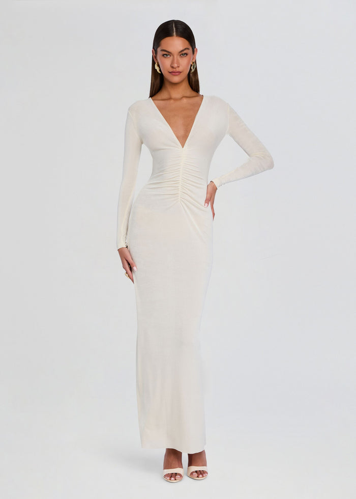 Front view of a cream Ebony Maxi Dress with a plunging V neckline and ruched center on a model. media 5 of 5