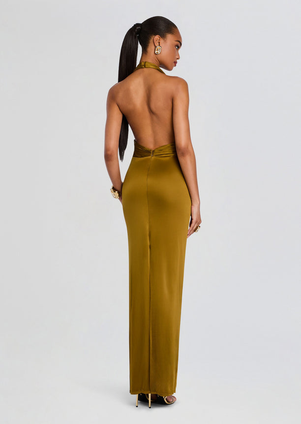 Back view of Payton Dress in mustard satin halter neck with open back and fitted waist.