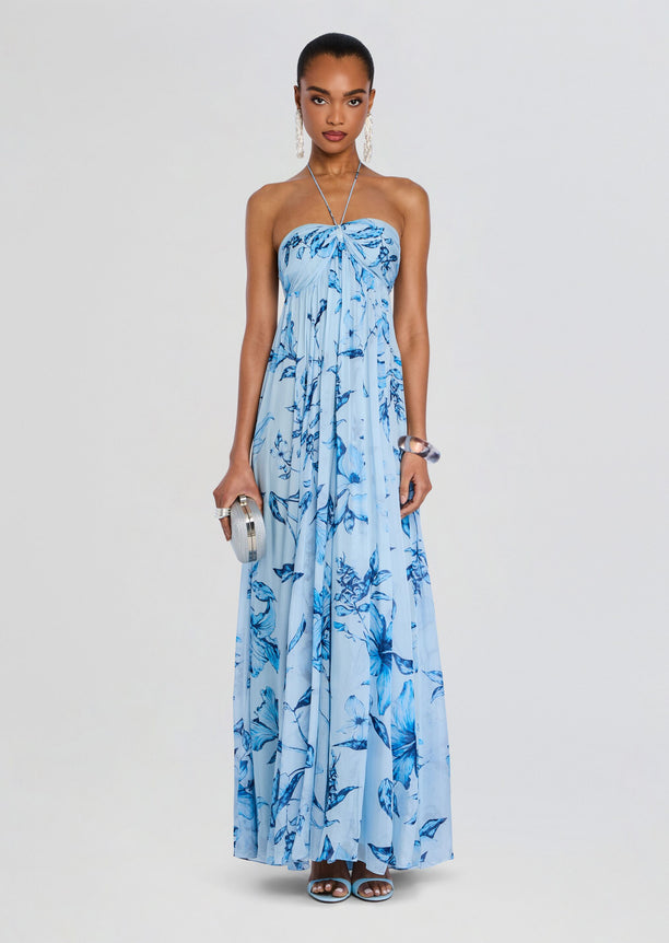 Strapless blue floral maxi dress from Milo with halter neckline and flowing skirt.