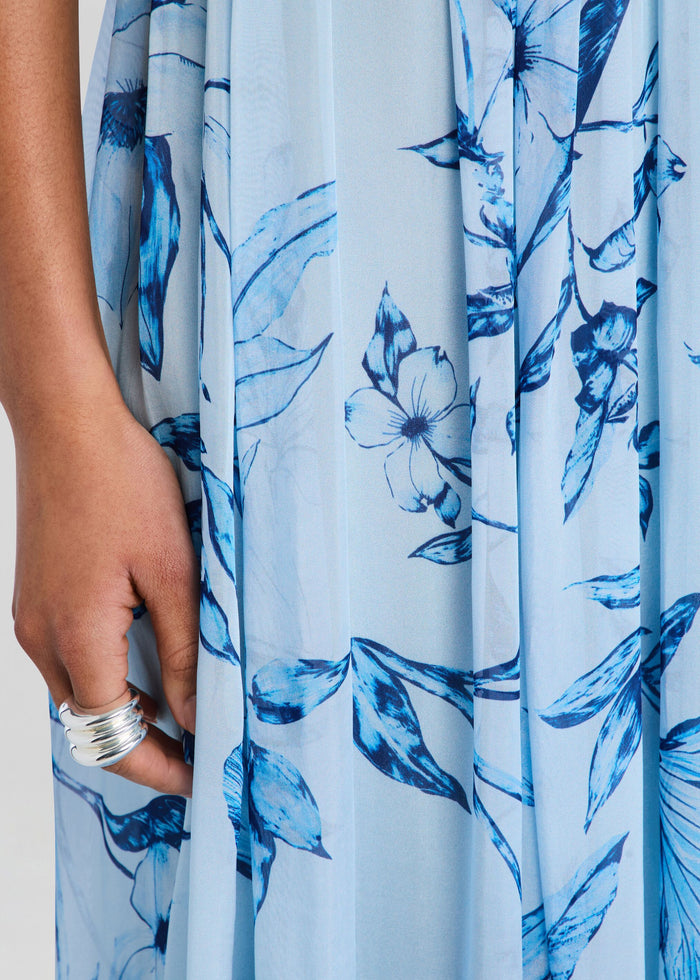 Close-up of Milo Strapless Flared Dress fabric in light blue with dark blue floral print media 2 of 5