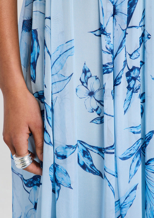 Close-up of Milo Strapless Flared Dress fabric in light blue with dark blue floral print
