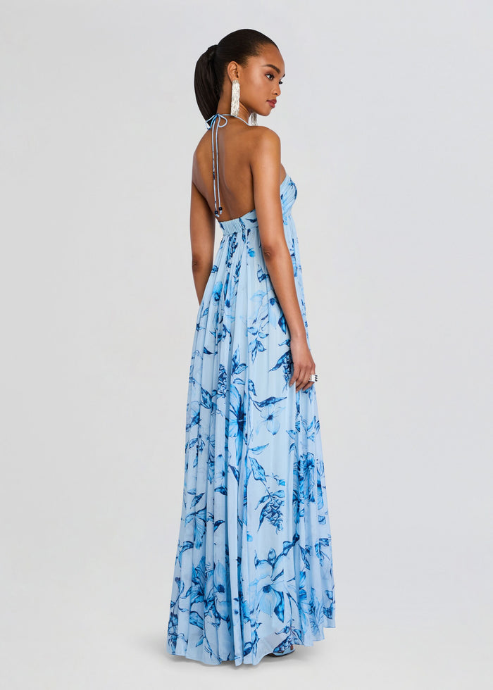 Back view of a light blue floral strapless flared dress with a tie at the back. media 4 of 5