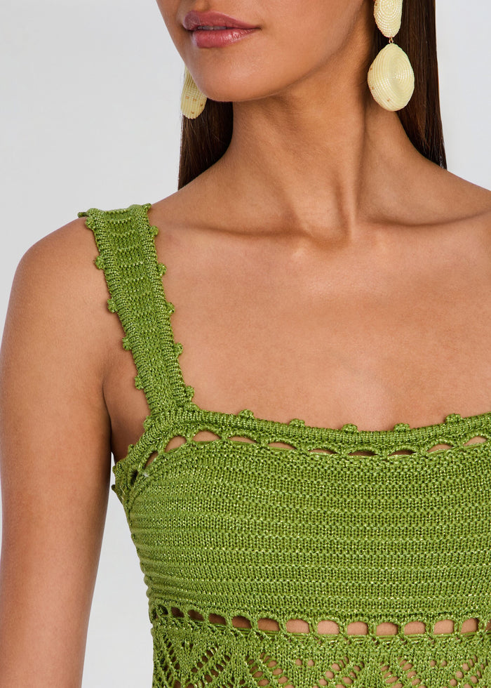 Close up of a green crochet strap and neckline showing intricate stitches and texture media 2 of 5