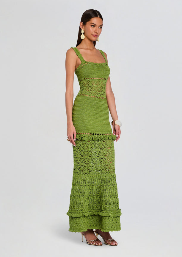 Olive green crochet Winona dress with a fitted bodice and lace panels, full length on the model.
