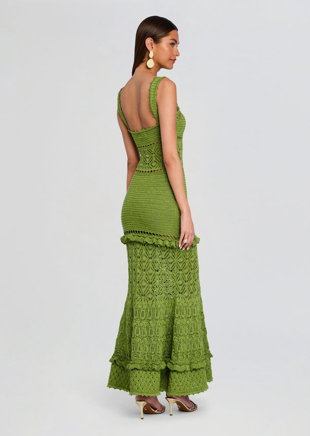 Back view of the olive green crochet Winona dress featuring an open back and textured lace midsection.