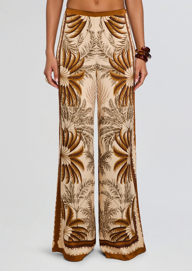 Front view of Sunny Pant wide-leg pants in beige with brown palm leaf print and brown trim