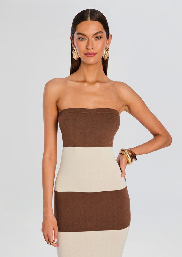 Front view of a strapless Carrie Knit Maxi Dress in brown and cream color blocks on a model