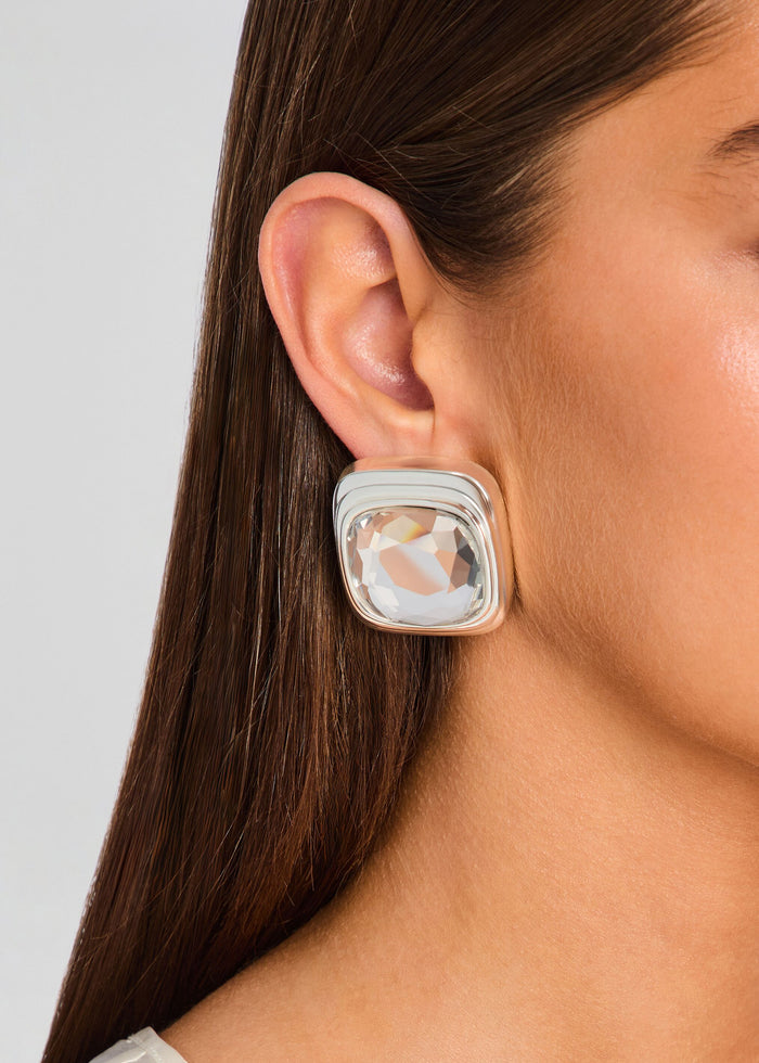 Clive earring featuring a square clear crystal set in a rounded silver bezel on the earlobe media 2 of 5