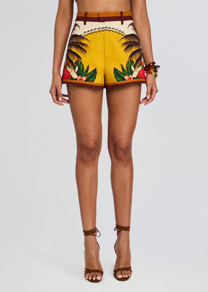 Front view of Tansie Short with tropical palm print on yellow fabric and brown trim. media 1 of 5