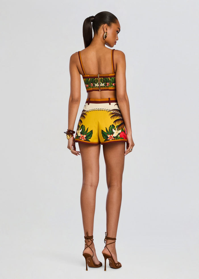 Back view of Cricket Bustier Top with tropical print and thin straps on a model showing a back zipper. media 5 of 5