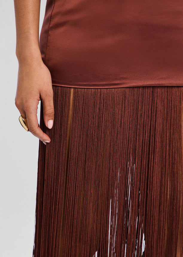 Close-up of the brown fringe detailing on the Cyrelle Dress.