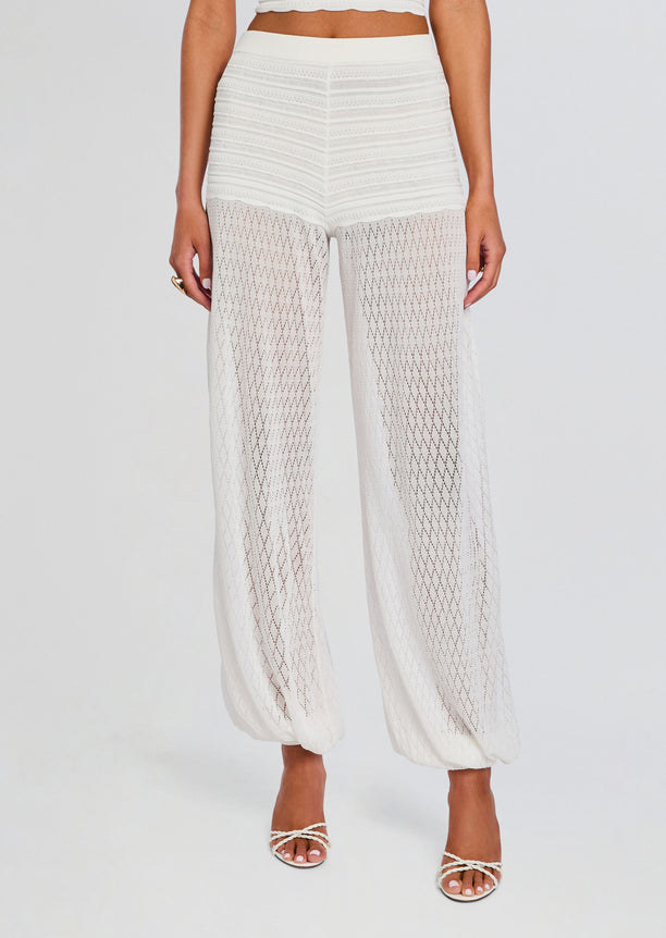 Devyn Pant white high waisted pants with opaque knit top and sheer diamond lattice bottom