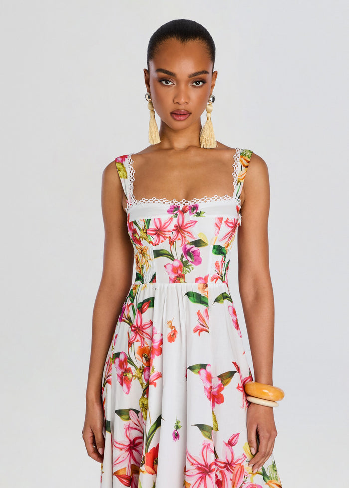 Front view of Maui Long Dress on a model showcasing a tropical floral print and square neckline. media 5 of 5