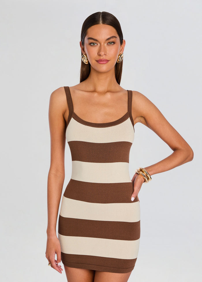 Front view of the model in a beige and brown striped knit mini dress with thin straps. media 5 of 5