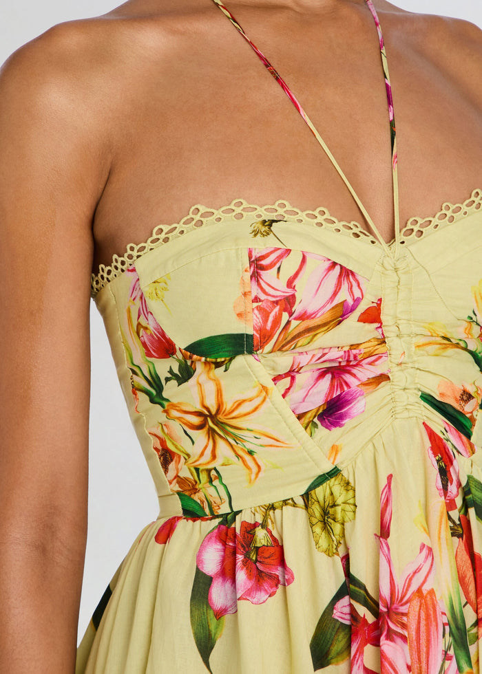 Close-up of the Dahlia Short Dress bodice with lace trim along the top and bright floral print. media 2 of 5