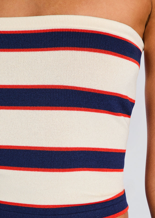 Close-up of Theodora Tube Top showing cream knit fabric with navy blue and red stripes.