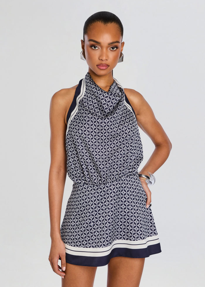 Front view of the navy and white patterned Winny Mini Dress with halter neckline and draped bodice media 5 of 5
