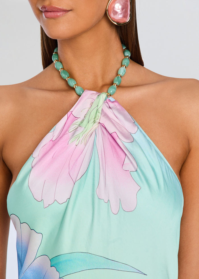 Halter neck Anat Dress close up at the neck with turquoise bead necklace and pink earring media 2 of 5