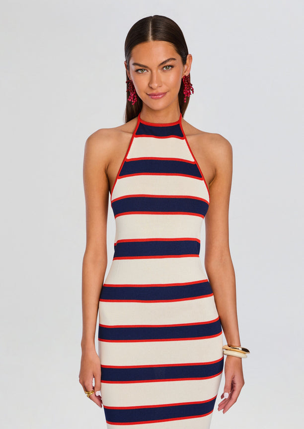 Arrabella Knit Maxi Dress in cream navy and red stripes worn as a halter neck on a model.