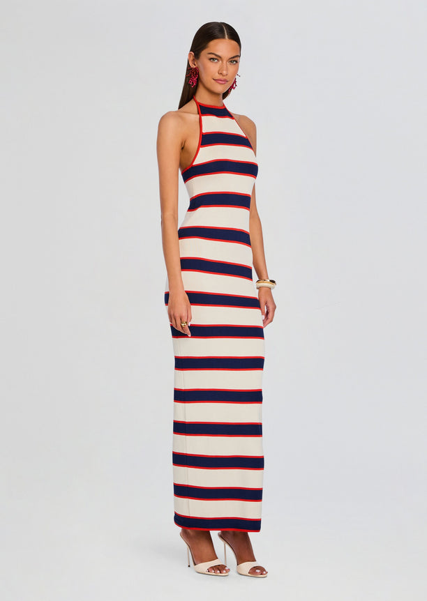 Model wearing Arrabella Knit Maxi Dress with navy red and cream stripes halter neck and full length