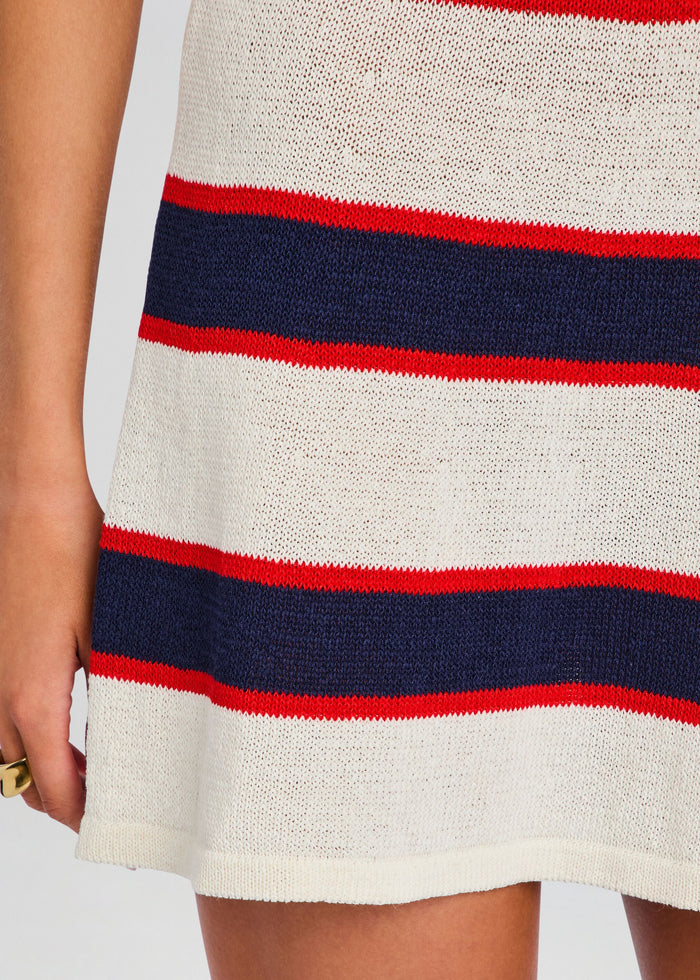 Close-up of cream knit fabric with navy and red stripes from the Azriel Knit Mini Dress media 2 of 5